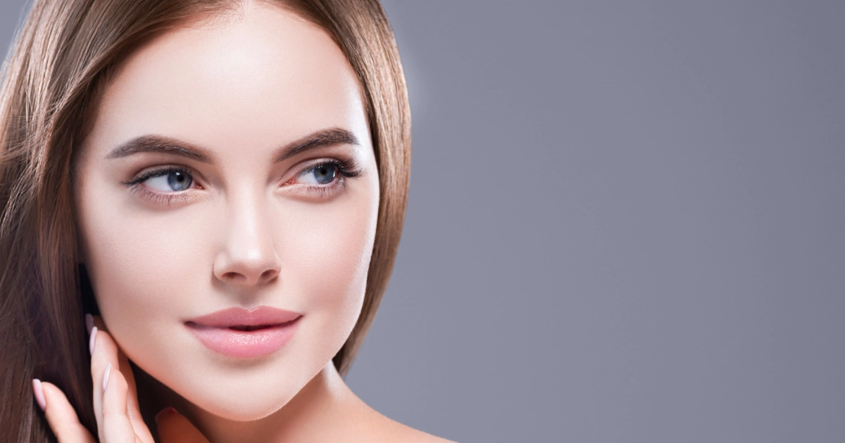 Woman showing a defined jawline after Sculptra in Johnson City, TN treatment, highlighting natural facial contour and lifted appearance.