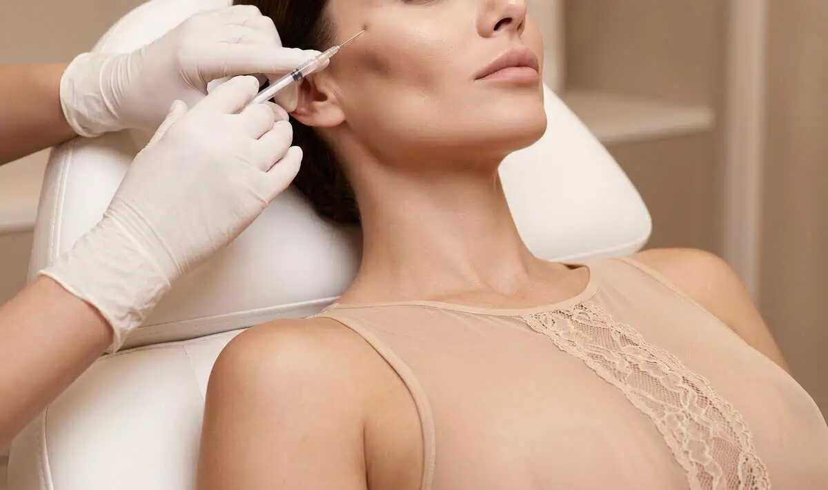Provider performing a collagen-stimulating facial injection in Johnson City, TN.