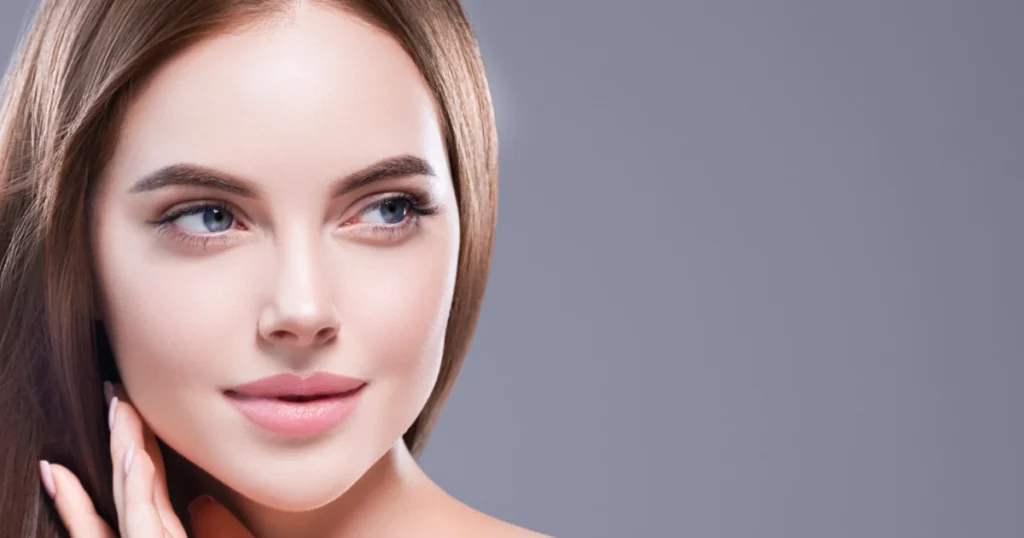 Current image: Woman showing a defined jawline after Sculptra in Johnson City, TN treatment, highlighting natural facial contour and lifted appearance.